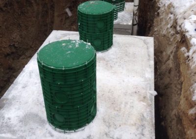 Septic tank with concrete pump chamber